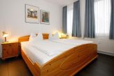 Schlafzimmer mit Doppelbett