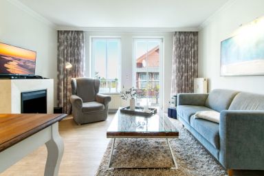 Seehof - Hübsche, gemütliche Ferienwohnung mit Balkon und Meerblick in toller Strandlage