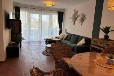 NordseeResort Friesland - Stilvolles Familienapartment an der Nordsee mit Balkon und privater Sauna