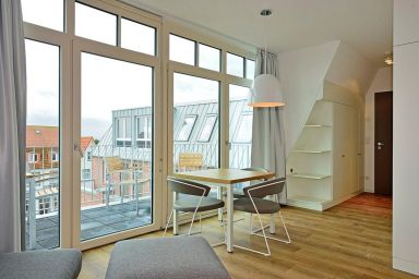 Aparthotel Anna Düne - Erstklassiges Apartment an der Nordsee mit sonnigem Süd-Balkon und Sauna im Haus
