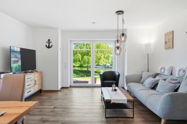 Grachtendrööm - Traumhafte Ferienwohnung (72qm) für 4 Personen mit Terrasse am Wasser