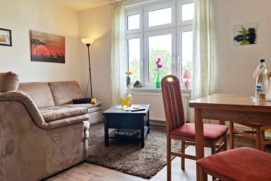 Haus Sonnenröschen - Ferienwohnung Sonne nahe Strand und mit Garten