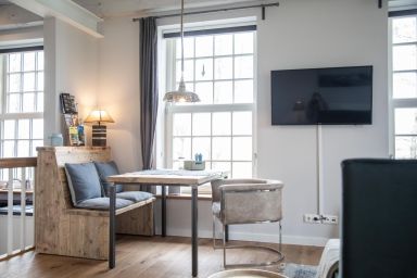 Gulfhof Dreybült - „Idyllische Ferienwohnung in Neßmersiel: Entspannung, Strand & Meer erleben!“