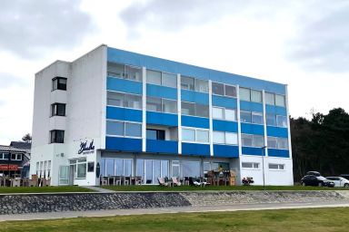 Haus Seehund - Maritime Ferienwohnung für 4 Personen mit Panorama-Meerblick und Schwimmbad