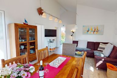 Feriendorf Südstrand - Strandnahes 4-Personen-Ferienhaus mit Garten, Terrasse, Sauna und Privatparkplatz