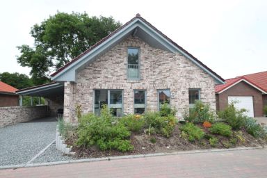 Feriendorf Südstrand - Strandnahes Ferienhaus für 6 Personen und Hund mit Kamin & Garten in ruhiger Lage