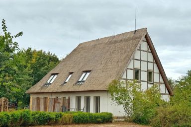 Schwarbe - Reethaus Paulsen WE 1 Hans-Jürgen - Ländliche Idylle im Reetdachhausmit Sauna
