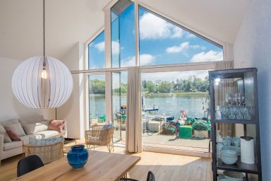 Netzschuppen 5 - Ferienhaus "Netzschuppen 5" erste Reihe am Hafen in Kappeln.