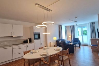 App. 221 "Albatros" - Familienfreundliches Ferienapartment "Albatros" in einmaliger Lage direkt an Kurstrand und Seebrücke
