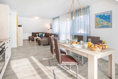 Ferienhaus Abendrot OG - Moderne Ferienwohnung in Loddin mit Garten – Familienfreundlich & ruhig gelegen