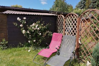 Appartement in Klockenhagen mit Terrasse, Grill und Garten