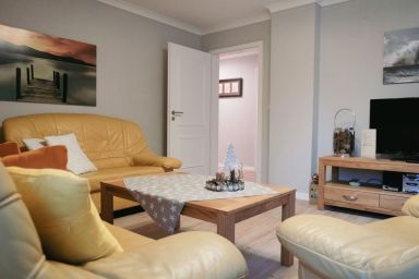 Ferienwohnung Kutscherhaus am Meer mit Balkon zur Südseite - 4 Raum-Fewo mit einem Balkon und W-Lan