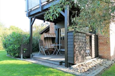 Ferienwohnungen Alter Bahnhof mit Terrasse und Garten OFC 06 - Nr. 2 Fewo mit Kamin, Terrasse und Strandkorb