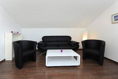 Haus Hafenromantik in Neuharlingersiel - Ferienwohnung Gebrüder