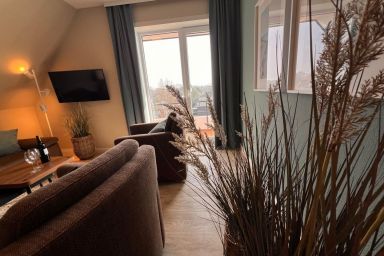 Ferienwohnung  NW 45 mit Süd Balkon