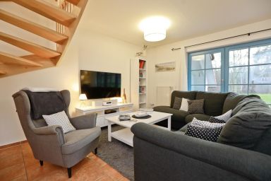 Ferienpark Freesenbruch - Komfortable Doppelhaushälfte mit Terrasse, Gartenblick und Pool in Zingst
