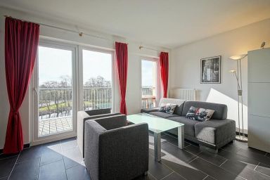 NordseeResort Friesland - Tolles Ferienapartment an der Nordsee mit Südbalkon, Sauna und Whirlbadewanne