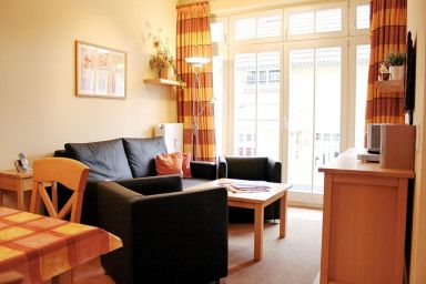 Dünenschloss - Strandnahe Ferienwohnung an der Ostsee mit Balkon, Saunabereich & Pool im Haus!