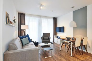 Deichhäuser Anna Küste - Strandnahes Apartment mit zwei Terrassen inkl. freier Schwimmbad- & Saunanutzung