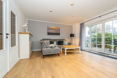 Leos Hüs - Ferienhaushälfte für max. 6 Personen, mit Terrasse und Sauna.