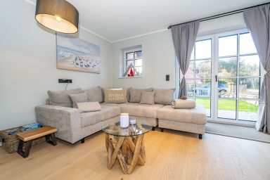 Haus Rosi - Ferienhaushälfte in Westerland mit Sauna und Garten. Haustiere sind Willkommen.