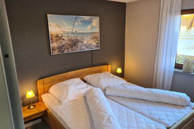 Ferienwohnung Möwenweg 17 - Ferienwohnung Möwenweg 17 in Carolinensiel mit WLAN, Balkon & Garage