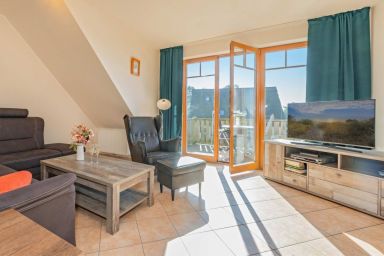 Ferienwohnung Skorpion mit Balkon, Sauna und Blick auf das Achterwasser - Moderne Ferienwohnung mit Sauna & Garten – Platz für 8 Gäste in Strandnähe
