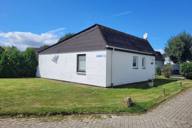 Ferienhaus Klein - Ferienhaus Klein in Butjadingen. Komfortabler Aufenthalt am Meer mit Garten
