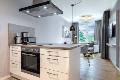 Ferienwohnungen am Godewindpark Travemünde - Modernes Apartment mit Wellness, überdachtem Balkon und Strandnähe in Travemünde