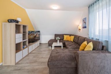Ferienhaus Sonnenschein EG mit Sauna, Terrasse und Garten - Moderne Ferienwohnung in Loddin mit Sauna & großem Garten – nur 2 km zum Strand