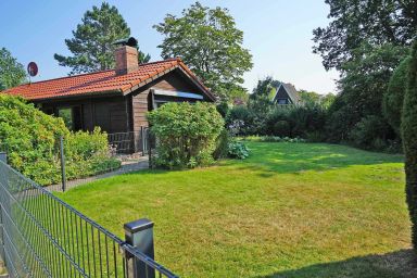 Blockhaus mit W-LAN - grosse Terrasse mit Strandkorb - - mit Zaun in ruhiger Lage