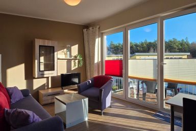 Ferienwohnung KWF3aOG - 4-Zimmer-Maisonettewohnung für 7 Pers. im Küstenwald