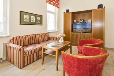 Villa Aegir - Ferienapartment an der Ostsee mit Wintergarten - Saunanutzung im Haus inklusive!