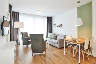 Deichhäuser Anna Küste - Nordsee-Apartment in ruhiger Lage mit Balkon inkl. Schwimmbad- & Saunanutzung