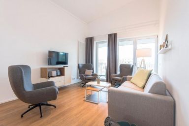 Apartmentvilla Anna See - Familien-Apartment in Strandnähe mit großer Loggia, zwei Bädern & Sauna im Haus!