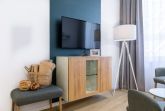 Wohn-/Essbereich mit Flatscrren-TV