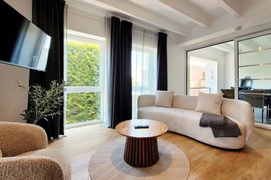 Charmante Ferienwohnung mit Terrasse - nur 50m zum Strand mit eigenem Parkplatz und Fahrradunterstellmöglichkeit - Gemütliche Ferienwohnung "Windjammer" mit Parkplatz – Nur 50 Meter zur Ostsee