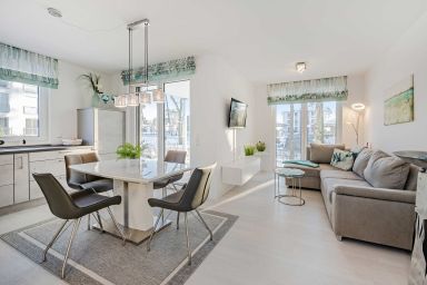 Ferienwohnung Haff Idyll - Hochwertiges Appartement in ruhiger Lage, mit Terrasse,kostenfreier Sauna und Stellplatz