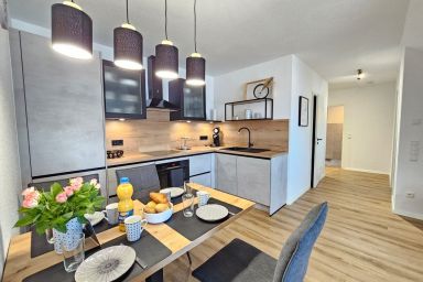 FeWo Küstenquartier Dornumersiel - Modernes Ferienapartment Küstenquartier Dornumersiel mit Balkon und WLAN