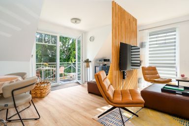 Oktopus - Neubauwohnung (80qm) mit Balkon direkt am Wasser bei Greetsiel!