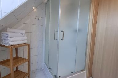 Haus am Brunnen - Ferienwohnung Orchidee