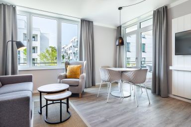 Ferienwohnungen am Godewindpark Travemünde - Helles 2-Zimmer-Apartment mit Loggia und exklusivem Wellnessbereich