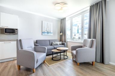 Godewindpark Travemünde Exklusivsuite 3.03 - luxuriös & hundefreundlich - Modernes Ferienapartment mit sonniger Loggia in Westlage – Ihr stilvoller Rückzugsort nahe der Ostsee