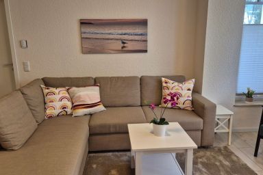 Strandquartett Wohnung 11 - Gemütliche 3-Zimmer-Ferienwohnung mit Kamin & Terrasse für bis zu 4 Personen