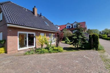 Ferienhaus Windland - mit Garten, Kamin und Sauna - Gemütliches Ferienhaus Windland in Dranske mit Sauna, Kamin & Garten