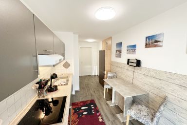 MR: Haus Inselperle mit Blick auf den Bodden - Wohnung 01 mit Terrasse und Boddenblick