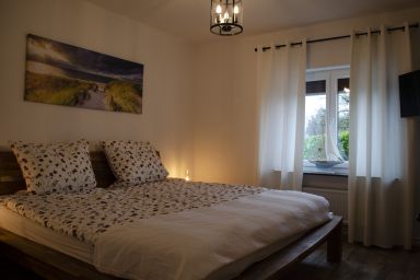 Ferienwohnung Asmuss in Rabenholz - Ferienwohnung Asmuss