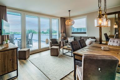 Ferien auf Krautsand GmbH - Elbaussicht Appartement D4 R2 - Dachterrasse mit Elbblick
