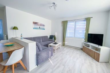 Kajütenhus Komfort-Ferienwohnungen - Steuermannskajüte Freest 1