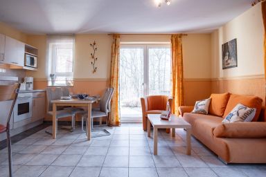 Ferienhaus Am Boddenufer - Ferienwohnung Schwalbennest